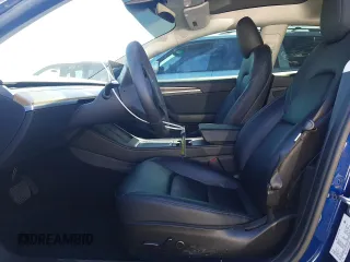 2023 Tesla Model 3 with VIN 5YJ3E1EA5PF652212, listed as a Copart auction lot 57348395 with 8,780 mi miles and Salvage title. Bid and sale history available at DreamBid. Image 7.