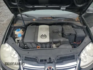 2009 Volkswagen Jetta S z VIN 3VWJZ71K09M010117, wystawiony jako Copart lot #56309165 z przebiegiem 181 692 mil mil oraz Szkoda całkowita • Salvage title. Historia ofert i sprzedaży dostępna na DreamBid. Obrazek 11.