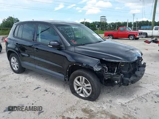2013 Volkswagen Tiguan S with VIN WVGAV3AXXDW596963, listed as a IAAI auction lot 42699878 with 93,009 mi miles and . Bid and sale history available at DreamBid. Image 1.