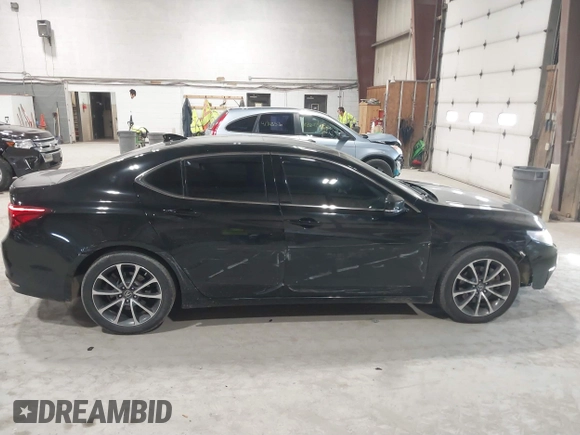 2015 Acura TLX Advance z VIN 19UUB3F76FA004303, wystawiony jako IAAI lot #41748160 z przebiegiem 138 528 mil mil oraz . Historia ofert i sprzedaży dostępna na DreamBid. Obrazek 13.