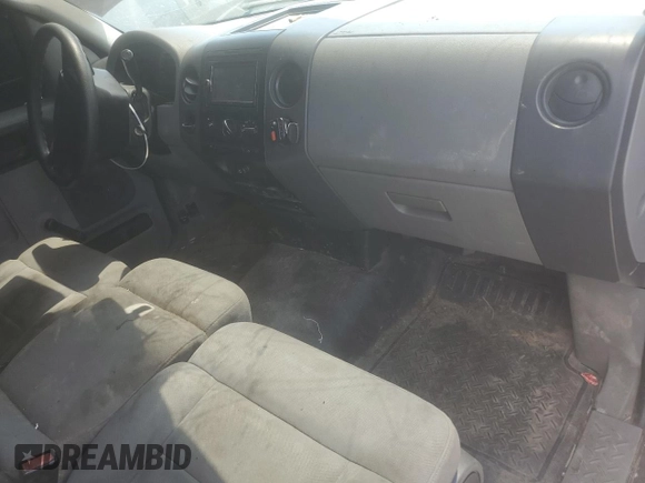 2004 Ford F-150 XL with VIN 1FTRF12W64NA28259, listed as a Copart auction lot 62601685 with 217,906 mi miles and Salvage title. Bid and sale history available at DreamBid. Image 8.