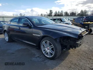 2017 Jaguar XJ with VIN SAJWJ2GD0H8W07154, listed as a Copart auction lot 42090375 with 66,546 mi miles and Salvage Title. Bid and sale history available at carsss.com. Image 4.