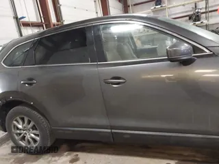 2019 Mazda CX-9 Touring with VIN JM3TCBCY3K0305147, listed as a IAAI auction lot 41676425 with 104,265 mi miles and . Bid and sale history available at carsss.com. Image 13.