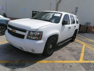 2011 Chevrolet Tahoe Commercial with VIN 1GNLC2E02BR325621, listed as a IAAI auction lot 41866389 with 167,693 mi miles and . Bid and sale history available at DreamBid. Image 2.