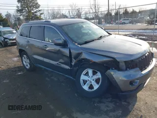 2011 Jeep Grand Cherokee 70th Anniversary with VIN 1J4RR4GT6BC715848, listed as a IAAI auction lot 41562152 with 119,910 mi miles. Bid and sale history available at carsss.com. Image 1.