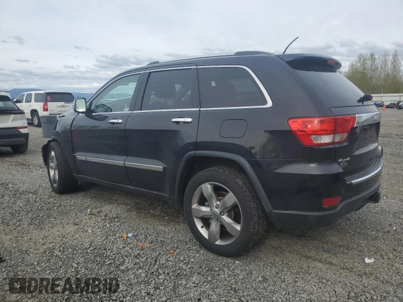 2013 Jeep Grand Cherokee Overland with VIN 1C4RJFCGXDC643802, listed as a Copart auction lot 52429535 with 122,014 mi miles and Salvage Title. Bid and sale history available at carsss.com. Image 2.
