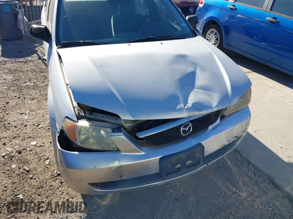 2001 Mazda Protege DX with VIN JM1BJ222810410482, listed as a IAAI auction lot 40799727 with 159,446 mi miles and . Bid and sale history available at DreamBid. Image 6.