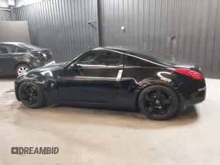 2005 Nissan 350Z Touring with VIN JN1AZ34E45M653631, listed as a IAAI auction lot 41689560 with 147,635 mi miles. Bid and sale history available at carsss.com. Image 14.