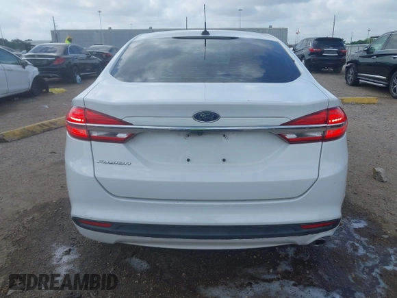 2018 Ford Fusion S z VIN 3FA6P0G71JR166706, wystawiony jako IAAI lot #42275722 z przebiegiem 33 752 mil mil oraz . Historia ofert i sprzedaży dostępna na DreamBid. Obrazek 16.