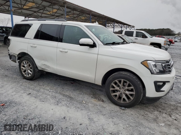 2021 Ford Expedition XLT with VIN 1FMJU1JT9MEA21778, listed as a Copart auction lot 89119335 with 86,073 mi miles and Salvage Title. Bid and sale history available at carsss.com. Image 4.