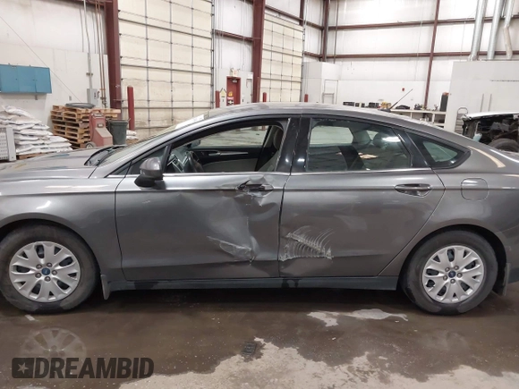 2013 Ford Fusion S with VIN 3FA6P0G7XDR215423, listed as a IAAI auction lot 42019599 with 134,433 mi miles. Bid and sale history available at carsss.com. Image 14.