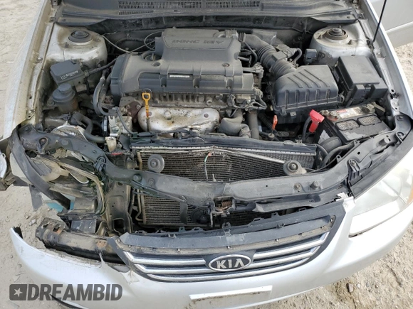 2009 Kia Spectra EX z VIN KNAFE222695665181, wystawiony jako Copart lot #42852235 z przebiegiem 234 852 mil mil oraz Szkoda całkowita • Salvage title. Historia ofert i sprzedaży dostępna na DreamBid. Obrazek 11.