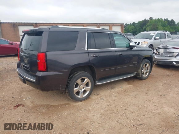 2016 Chevrolet Tahoe LTZ z VIN 1GNSKCKC3GR112445, wystawiony jako IAAI lot #42312996 z przebiegiem 107 511 mil mil oraz . Historia ofert i sprzedaży dostępna na DreamBid. Obrazek 4.