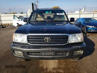 1999 Toyota Land Cruiser with VIN JT3HT05J5X0072564, listed as a Copart auction lot 77000044 with 312,428 mi miles and Salvage Title. Bid and sale history available at carsss.com. Image 5.