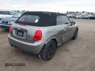2016 MINI Convertible z VIN WMWWG5C51G3A81075, wystawiony jako IAAI lot #41681717 z przebiegiem 54 956 mil mil oraz . Historia ofert i sprzedaży dostępna na DreamBid. Obrazek 4.