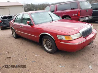 2001 Mercury Grand Marquis LS with VIN 2MEFM75W81X608158, listed as a IAAI auction lot 41669818 with 121,817 mi miles and . Bid and sale history available at DreamBid. Image 1.