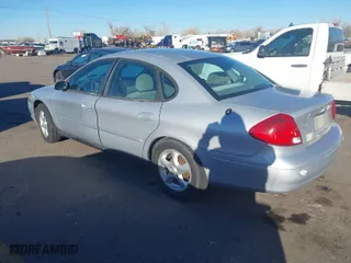 2003 Ford Taurus SE Standard with VIN 1FAFP53U23A245453, listed as a IAAI auction lot 41680402 with 96,761 mi miles. Bid and sale history available at carsss.com. Image 3.