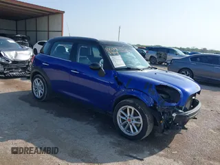 2015 MINI Countryman with VIN WMWZB3C56FWR43443, listed as a IAAI auction lot 41920848 with 91,192 mi miles and . Bid and sale history available at DreamBid. Image 1.