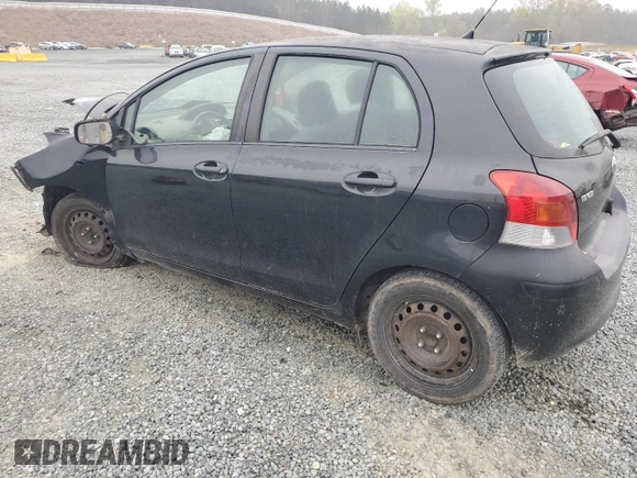 2009 Toyota Yaris with VIN JTDKT903095243922, listed as a Copart auction lot 51293545 with 196,909 mi miles and Salvage Title. Bid and sale history available at carsss.com. Image 2.