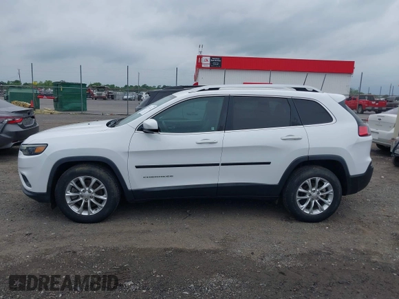 2019 Jeep Cherokee Latitude z VIN 1C4PJLCB8KD145129, wystawiony jako IAAI lot #42291722 z przebiegiem 89 155 mil mil oraz . Historia ofert i sprzedaży dostępna na DreamBid. Obrazek 14.