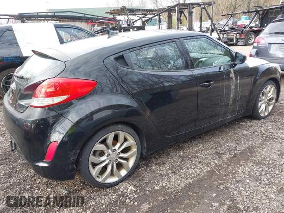 2012 Hyundai Veloster w/Black Int with VIN KMHTC6AD6CU020657, listed as a IAAI auction lot 42031670 with 187,585 mi miles and . Bid and sale history available at DreamBid. Image 4.