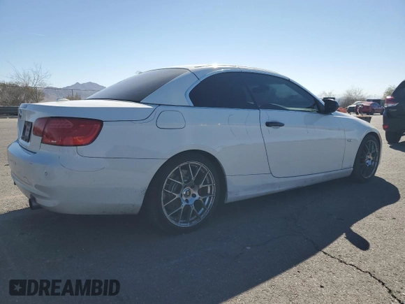 2013 BMW 3 Series 335i with VIN WBADX7C50DJ589769, listed as a Copart auction lot 77856914 with 143,235 mi miles and Salvage Title. Bid and sale history available at DreamBid. Image 3.