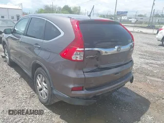 2016 Honda CR-V EX with VIN 2HKRM4H57GH652890, listed as a IAAI auction lot 42106880 with 118,422 mi miles and . Bid and sale history available at DreamBid. Image 3.