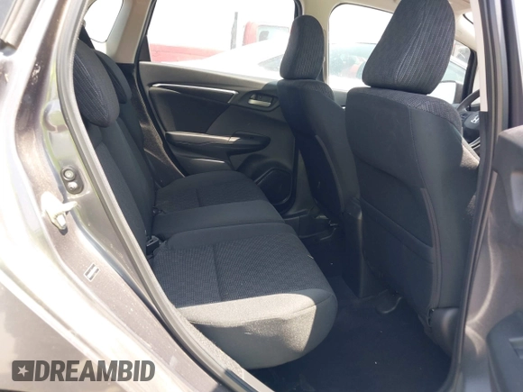 2015 Honda Fit LX with VIN 3HGGK5H55FM724750, listed as a IAAI auction lot 42282137 with 32,696 mi miles and . Bid and sale history available at DreamBid. Image 8.
