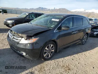 2016 Honda Odyssey Touring Elite with VIN 5FNRL5H9XGB002395, listed as a Copart auction lot 51706415 with Not provided miles and Salvage title. Bid and sale history available at DreamBid. Image 1.