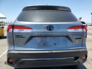 2024 Toyota Corolla Cross Hybrid S with VIN 7MUFBABG3RV043770, listed as a Copart auction lot 61007075 with 15,945 mi miles and Salvage title. Bid and sale history available at DreamBid. Image 6.