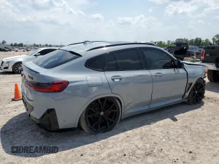 2022 BMW X4 M z VIN 5YM23EC02N9K87490, wystawiony jako Copart lot #65907114 z przebiegiem 55 555 mil mil oraz Szkoda całkowita • Salvage title. Historia ofert i sprzedaży dostępna na DreamBid. Obrazek 3.