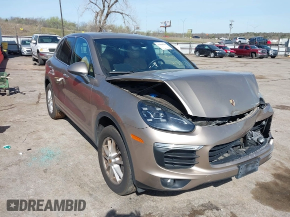 2016 Porsche Cayenne z VIN WP1AA2A2XGKA15096, wystawiony jako IAAI lot #41868566 z przebiegiem 93 640 mil mil oraz . Historia ofert i sprzedaży dostępna na DreamBid. Obrazek 1.