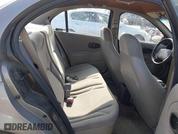 1999 Saturn SL z VIN 1G8ZH5280XZ249494, wystawiony jako IAAI lot #42347493 z przebiegiem 106 491 mil mil oraz . Historia ofert i sprzedaży dostępna na DreamBid. Obrazek 8.