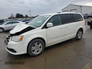 2013 Dodge Grand Caravan Crew with VIN 2C4RDGDG5DR740098, listed as a Copart auction lot 84491644 with 146,400 mi miles and Salvage Title. Bid and sale history available at DreamBid. Image 1.