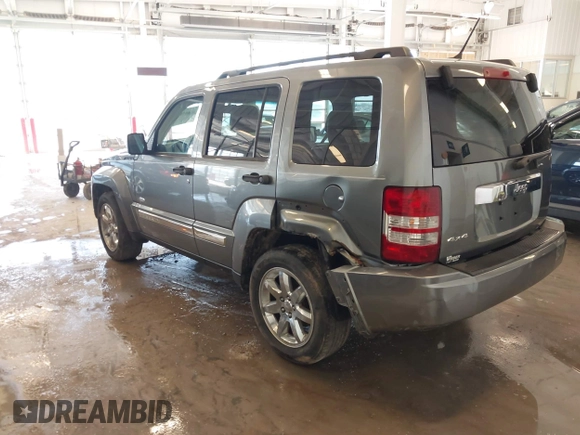 2012 Jeep Liberty Sport with VIN 1C4PJMAK9CW176792, listed as a IAAI auction lot 41685594 with 213,748 mi miles. Bid and sale history available at carsss.com. Image 3.