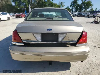 2000 Ford Crown Victoria with VIN 2FAFP73W4YX216080, listed as a Copart auction lot 53774835 with 144,404 mi miles and Salvage Title. Bid and sale history available at carsss.com. Image 6.