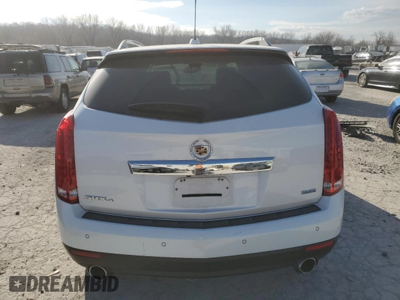 2016 Cadillac SRX Premium Collection with VIN 3GYFNDE36GS507147, listed as a Copart auction lot 84918574 with Not provided miles and Salvage title. Bid and sale history available at DreamBid. Image 6.