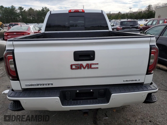2018 GMC Sierra 1500 Denali z VIN 3GTU2PEJ1JG531226, wystawiony jako Copart lot #49286105 z przebiegiem 130 923 mil mil oraz Szkoda całkowita • Salvage title. Historia ofert i sprzedaży dostępna na DreamBid. Obrazek 6.