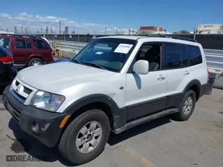 2003 Mitsubishi Montero LTD with VIN JA4NW51S43J017989, listed as a IAAI auction lot 41963880 with 161,443 mi miles. Bid and sale history available at carsss.com. Image 2.