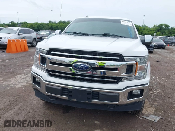 2018 Ford F-150 XL with VIN 1FTFW1E56JFA19198, listed as a IAAI auction lot 42537857 with 213,868 mi miles and . Bid and sale history available at DreamBid. Image 6.