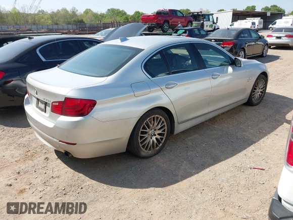 2011 BMW 5 Series 535i xDrive with VIN WBAFU7C58BC777569, listed as a IAAI auction lot 42072702 with 195,675 mi miles. Bid and sale history available at carsss.com. Image 4.