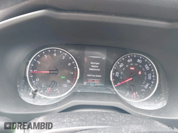 2019 Toyota RAV4 LE with VIN JTMG1RFV7KD017764, listed as a IAAI auction lot 41609055 with 69,803 mi miles and . Bid and sale history available at DreamBid. Image 7.