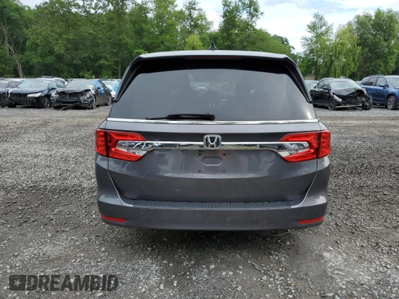 2018 Honda Odyssey EX z VIN 5FNRL6H56JB108661, wystawiony jako Copart lot #62807955 z przebiegiem 96 164 mil mil oraz Szkoda całkowita • Salvage title. Historia ofert i sprzedaży dostępna na DreamBid. Obrazek 6.