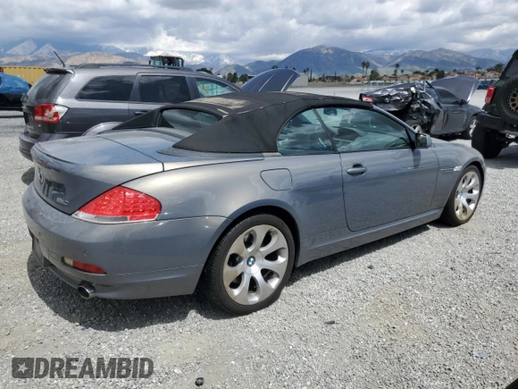 2007 BMW 6 Series 650i z VIN WBAEK13577CN81886, wystawiony jako Copart lot #51362585 z przebiegiem 110 174 mil mil oraz Czysty tytuł • Clean title. Historia ofert i sprzedaży dostępna na DreamBid. Obrazek 3.