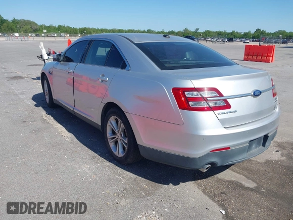 2013 Ford Taurus SEL with VIN 1FAHP2E81DG129229, listed as a IAAI auction lot 41999326 with 205,856 mi miles. Bid and sale history available at carsss.com. Image 3.