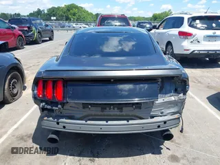 2015 Ford Mustang EcoBoost z VIN 1FA6P8TH5F5351476, wystawiony jako IAAI lot #42157688 z przebiegiem 134 131 mil mil oraz . Historia ofert i sprzedaży dostępna na DreamBid. Obrazek 17.