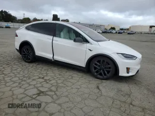 2019 Tesla Model X 75D with VIN 5YJXCAE21KF160589, listed as a Copart auction lot 50985585 with 31,273 mi miles and Salvage Title. Bid and sale history available at carsss.com. Image 4.