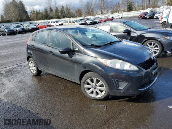 2012 Ford Fiesta SE z VIN 3FADP4EJ4CM183237, wystawiony jako Copart lot #48825605 z przebiegiem 92 798 mil mil oraz Szkoda całkowita • Salvage title. Historia ofert i sprzedaży dostępna na DreamBid. Obrazek 4.