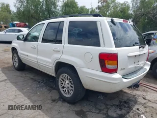 2002 Jeep Grand Cherokee Limited with VIN 1J4GX58S52C305020, listed as a IAAI auction lot 42025324 with 214,214 mi miles and . Bid and sale history available at DreamBid. Image 3.
