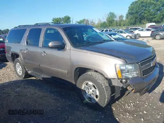 2014 Chevrolet Suburban LT with VIN 1GNSKJE76ER214080, listed as a IAAI auction lot 42766041 with 204,832 mi miles and . Bid and sale history available at DreamBid. Image 1.
